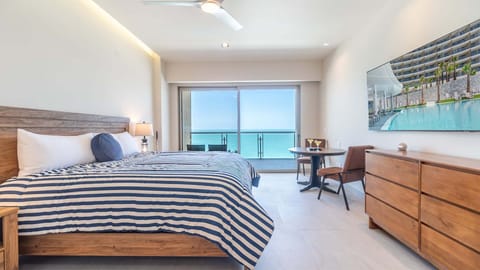 Smart TV and cozy seating area perfect for relaxing