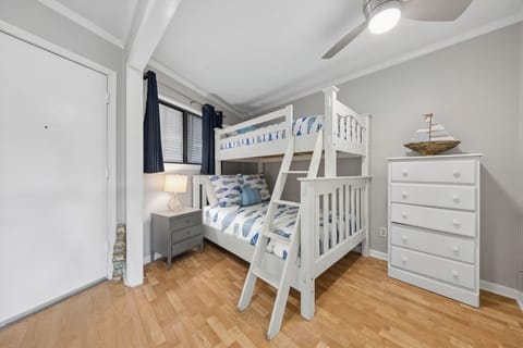 Bunk Area: 1 Twin over Full Bunk + 2 Twins in the hallway, access to hall bath with tub/shower combo
