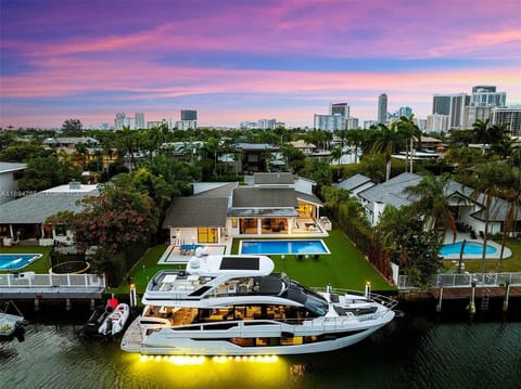 Evening colors wrapping the villa and skyline