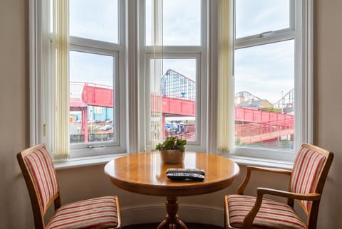 Sit by the bay window and watch Blackpool Pleasure Beach from your room.