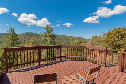 Wake up to breathtaking mountain views from your private wrap-around deck — the perfect spot for morning coffee or evening stargazing.