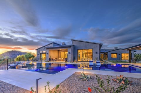 Serene retreat. Where the living room ends and the sunset begins. Experience true indoor-outdoor living by the water. 
