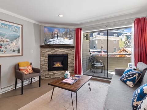 Living Area / Private Balcony Entrance / Fireplace / Entertainment