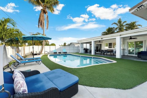 Your private tropical oasis, complete with a sparkling pool and lounging areas.