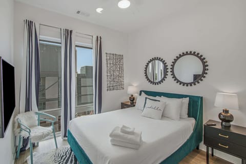 King Suite, bright and modern retreat with chic decor and city views, perfect for your Nashville getaway!