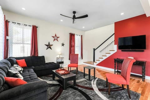 Vibrant space with plush seating, stylish decor, and a perfect spot for gathering!