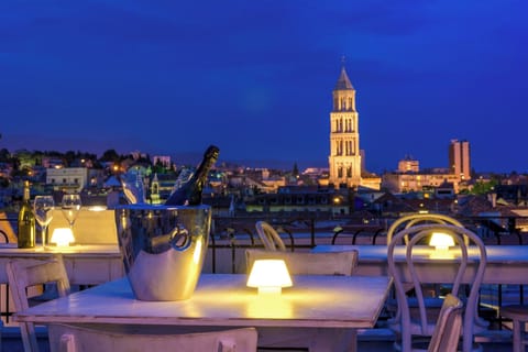 Rooftop terrace with spectacular view by night.
