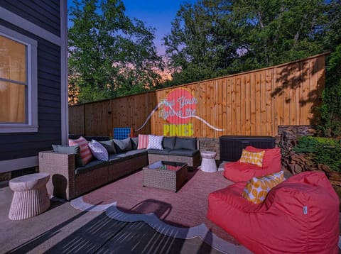 Dusk Till Dawn. Sink into the bean bag, watch the sky turn golden, and let the night take over — this backyard was made for evenings like this.