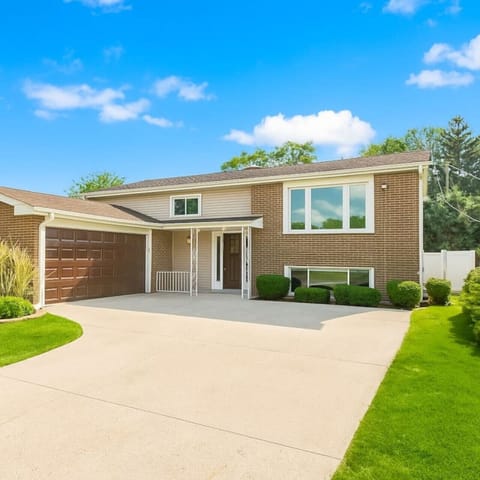 Front of the HomeBeautiful Suburban Home ExteriorWell-maintained exterior with curb appeal, located in a quiet and family-friendly neighborhood.