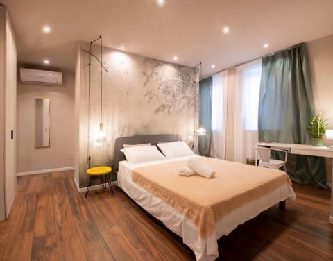Junior Quadruple Room | Minibar, desk, laptop workspace, blackout drapes