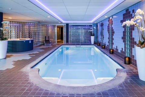 Unwind in glowing waters after a long travel day.