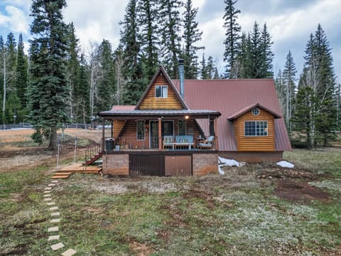 Classic A-frame cabin nestled in the pines—your perfect Duck Creek escape