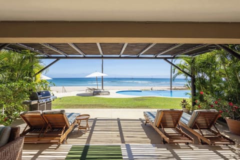 Wake up to the sound of the waves and endless ocean views from your private terrace. The perfect spot for sunrise coffee or sunset wine together.