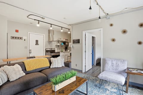 Relax in a cozy, modern studio with stylish décor and plenty of natural light. The comfortable living area and fully equipped kitchenette make it perfect for both unwinding and staying productive.