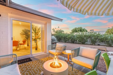 Outside patio and dining area with fireside table for relaxing during your stay at Hermosa House. Kick back and relax while enjoying those amazing Arizona evenings while sipping your favorite beverage.