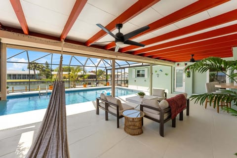 Relaxing outdoor patio with hammock and outdoor seating