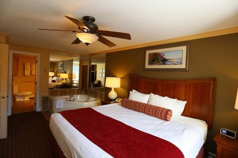 King size bed and whirlpool tub in Jackman Building at Pollard Brook