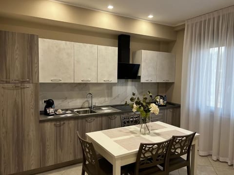 Deluxe Condo, Pets Not Allowed, Courtyard View | Private kitchen | Oven, stovetop, dishwasher, espresso maker