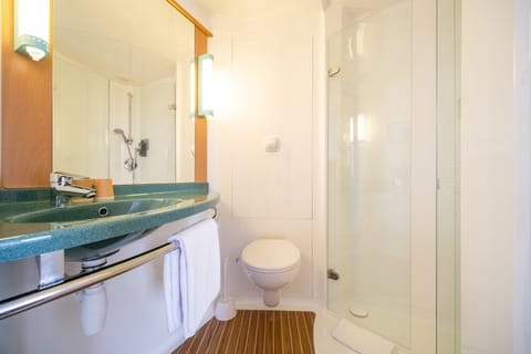 Shower, free toiletries, hair dryer, towels