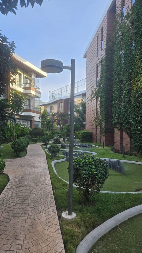 Comfort Apartment, Balcony, Pool View | Property grounds