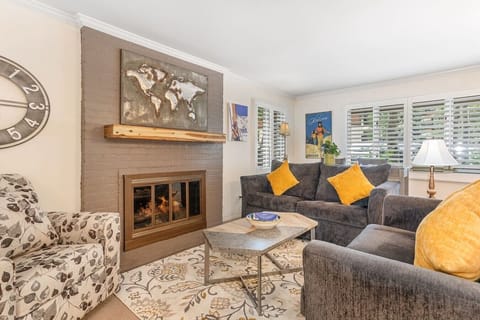 Cozy living room with fireplace and smart TV