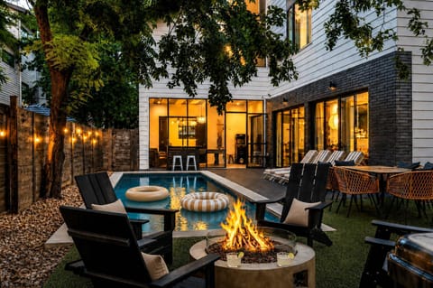 Firepit, pool, and seating areas