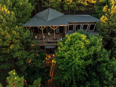 Nestled among towering pines, this secluded luxury cabin offers the perfect blend of privacy and comfort, featuring a spacious covered deck, peaceful forest views, and a true escape into nature. 🌲✨🏡