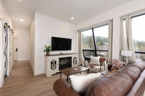 Enjoy your favorite tv shows on the comfortable leather couch or observe the awesome view of Evergreen from the panoramic windows! 