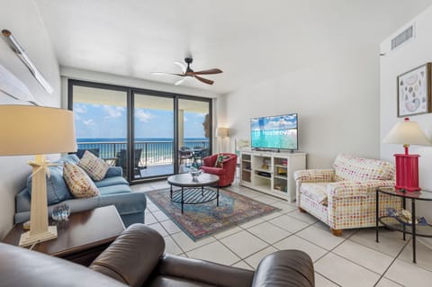 Signature Condo, 3 Bedrooms, Balcony, Beach View | Living room | 32-inch TV with satellite channels