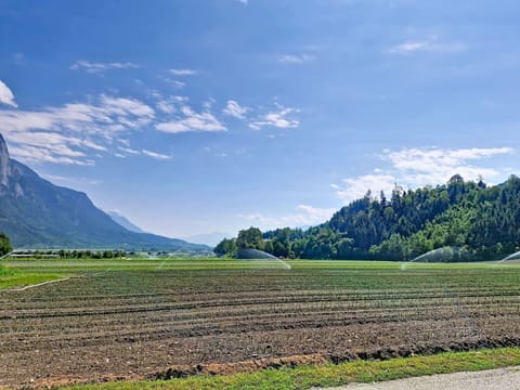 Sky, Mountainous Landforms, Green, Grass, Cloud, Mountain, Hill, Field, Natural Landscape, Grassland