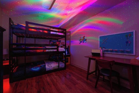 Amazing kids room complete with northern lights projector and craft area