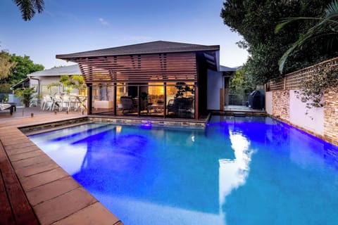 Spend sunny afternoons by the sparkling saltwater pool surrounded by tropical gardens.