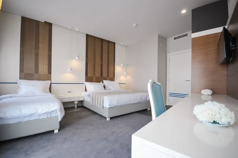 Suite, Balcony, Sea View | Minibar, in-room safe, desk, soundproofing