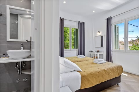 Double or Twin Room, Garden View | Minibar, desk, free WiFi, bed sheets