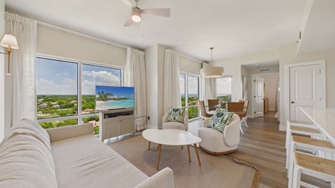 Open concept living area with sleeper sofa and TV (sleeps 2)