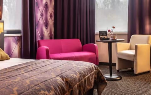 Lounge comfortably on the sofa before sinking into bed.