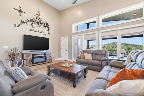 Bright and spacious living room with beautiful views!