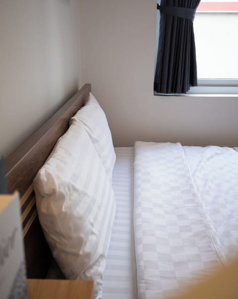 Apartment, 1 Bedroom | Desk, blackout drapes, iron/ironing board, WiFi (free)