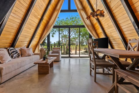 Villa | Living area | 50-inch LCD TV with cable channels