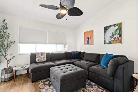 Living Room with Sectional Sofa and plenty of natural light