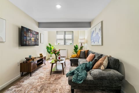 A bright, comfortable space to settle in, with natural light and room to relax after a full day out.