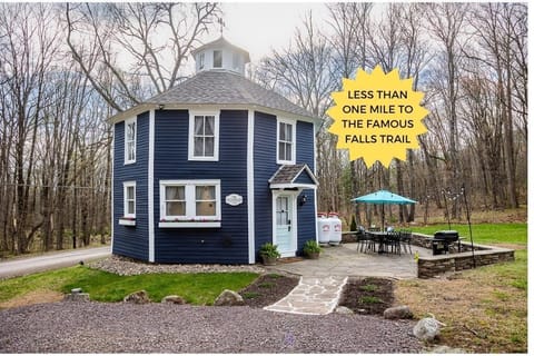 This unique 1880's octagon house boasts a large flagstone patio with lots of seating and a propane grill.
