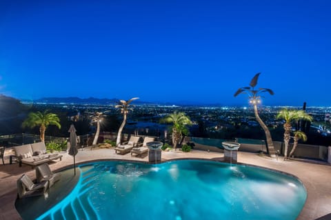 Experience unforgettable evenings by the resort-style infinity pool, where sparkling city lights and sweeping mountain views create the ultimate desert retreat.