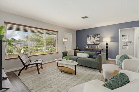 Secondary view of the living room highlighting the stylish accents
