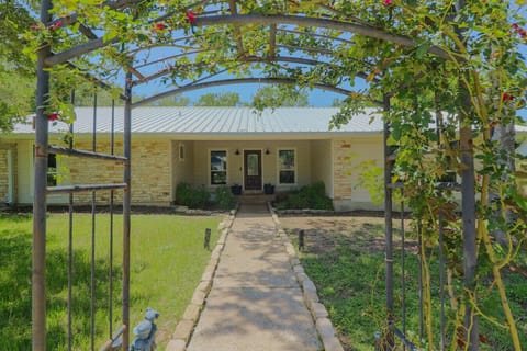Private home with a rose arbor walkway. Quiet neighborhood, close to everything.