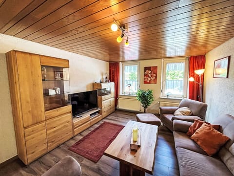 Furniture, Interior Design, Flooring, Couch, Floor, Wood, Ceiling, Living Room, Wood Flooring, Room