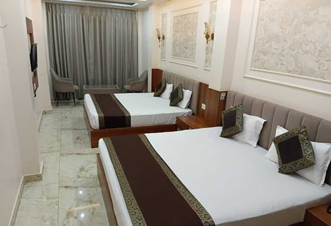Family Quadruple Room, City View | Desk, iron/ironing board, free WiFi