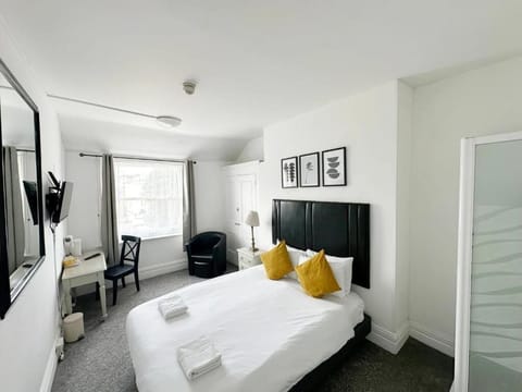 Double Room, City View | Iron/ironing board, free WiFi
