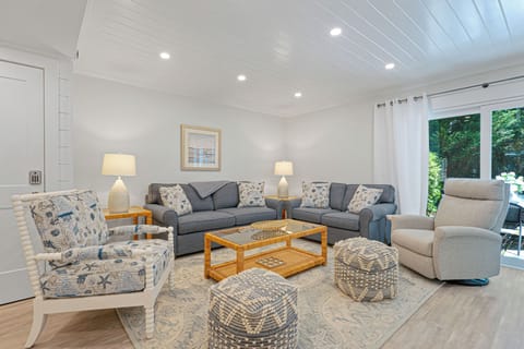 Bright and inviting living area with comfortable seating.