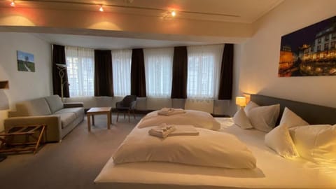 Superior Double Room | Living room | Flat-screen TV